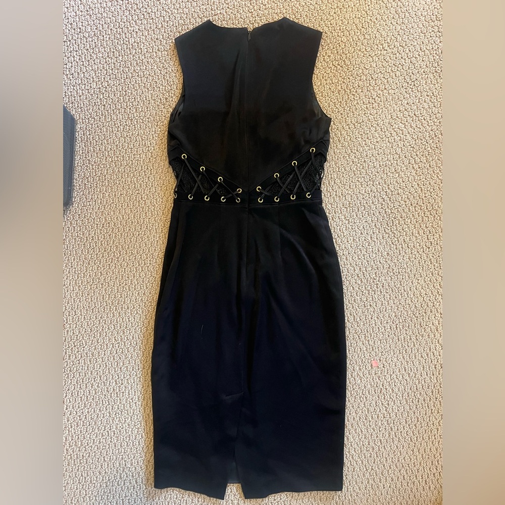 Bebe Black Midi dress with corset waist cut-outs